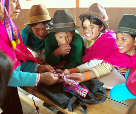 Grls of San Miguel training to craft necklaces