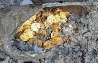 Secret stash of Roman gold and silver coins located in theater basement