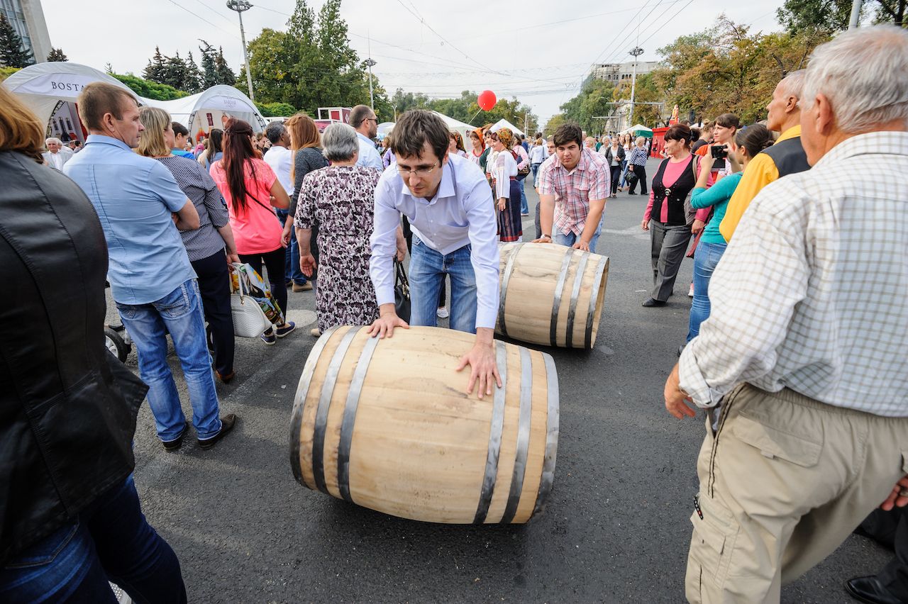 Rolling wine barrel to celebrate National Wine Day in Moldova