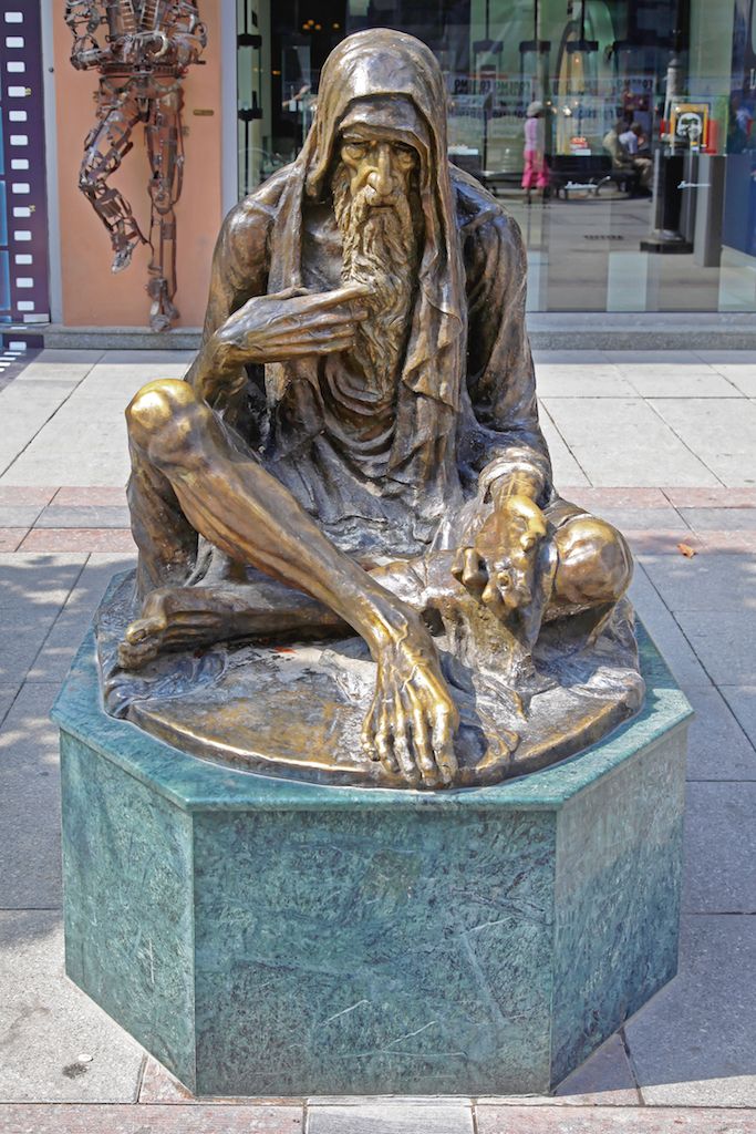 Poor Old Man Bronze Statue in Downtown Skopje, Macedonia